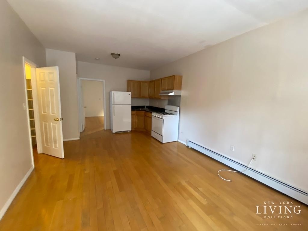 Kitchen and living room space in Queens