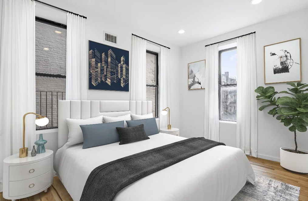 Manhattan bedroom with three windows and white walls
