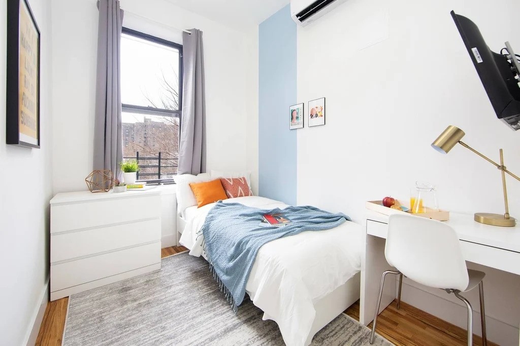 Brooklyn furnished bedroom with a window