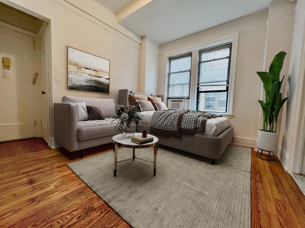 Manhattan studio with two windows and a bed