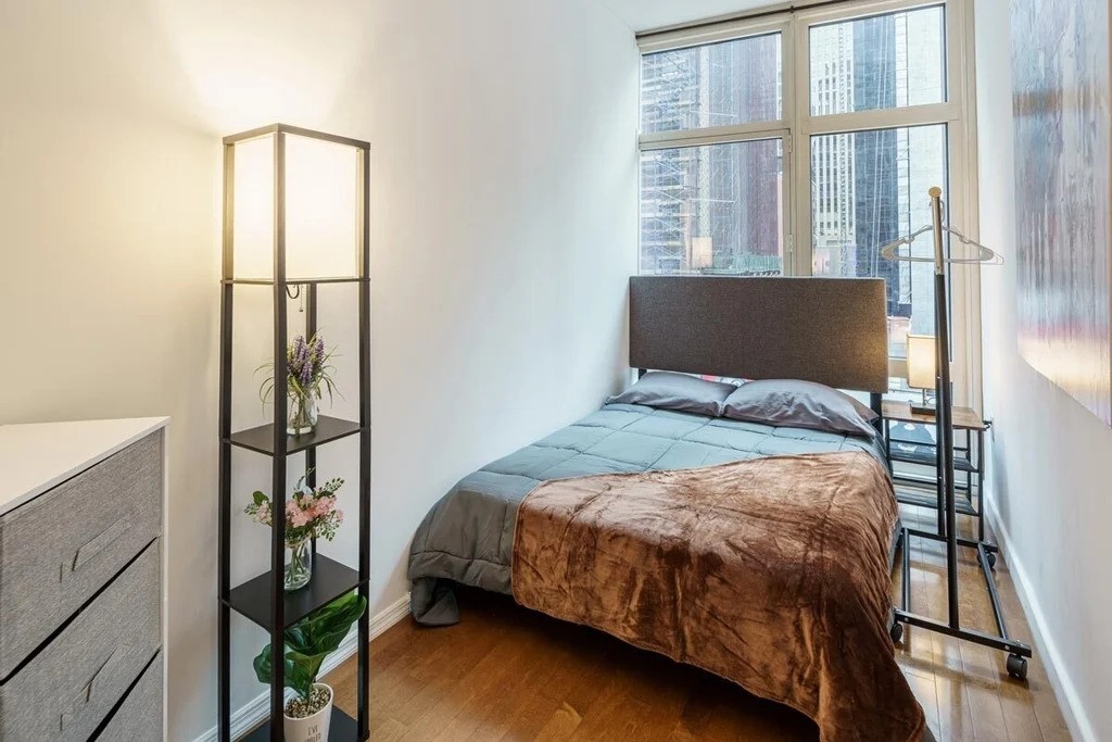 Manhattan bedroom with floor-to-ceiling windows