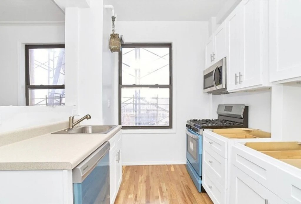 Current Manhattan listing with a modern windowed kitchen