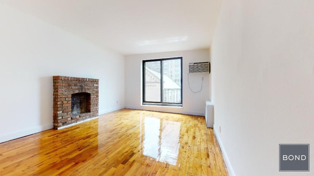 Upper East Side apartment with a brick fireplace