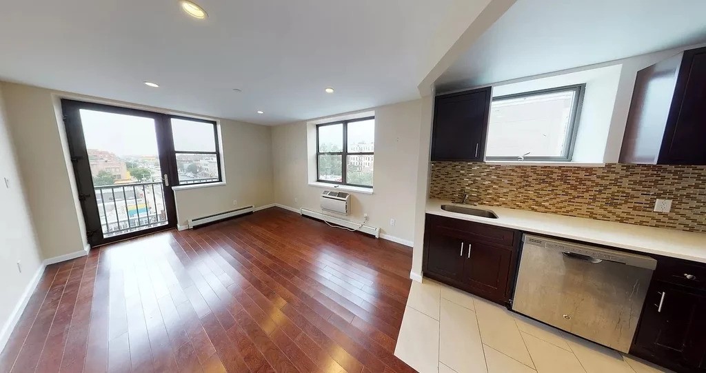 Modern kitchen and living room in Brooklyn apartment