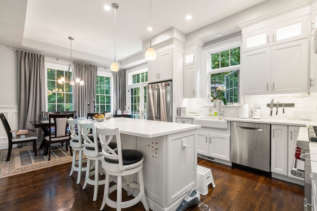 Modern kitchen with stainless steel appliances and an island