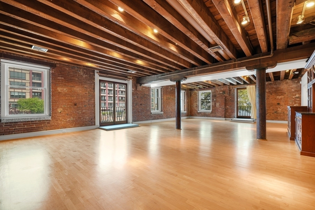 Spacious apartment in Boston's North End with exposed beams