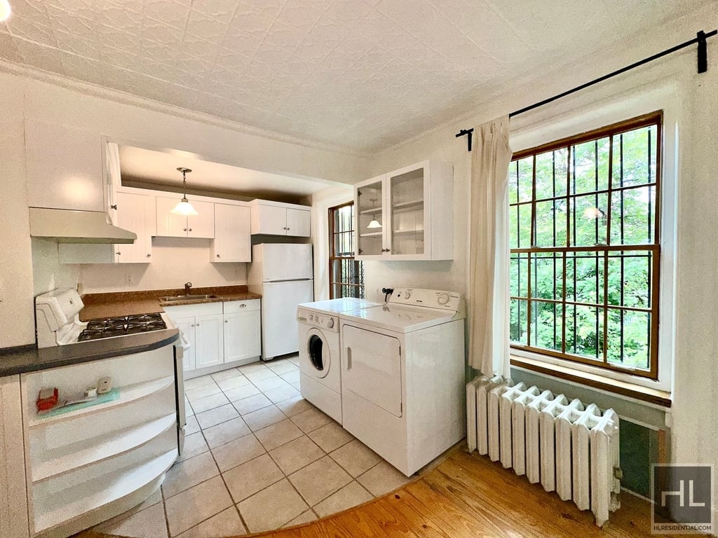 Manhattan listing with a white kitchen