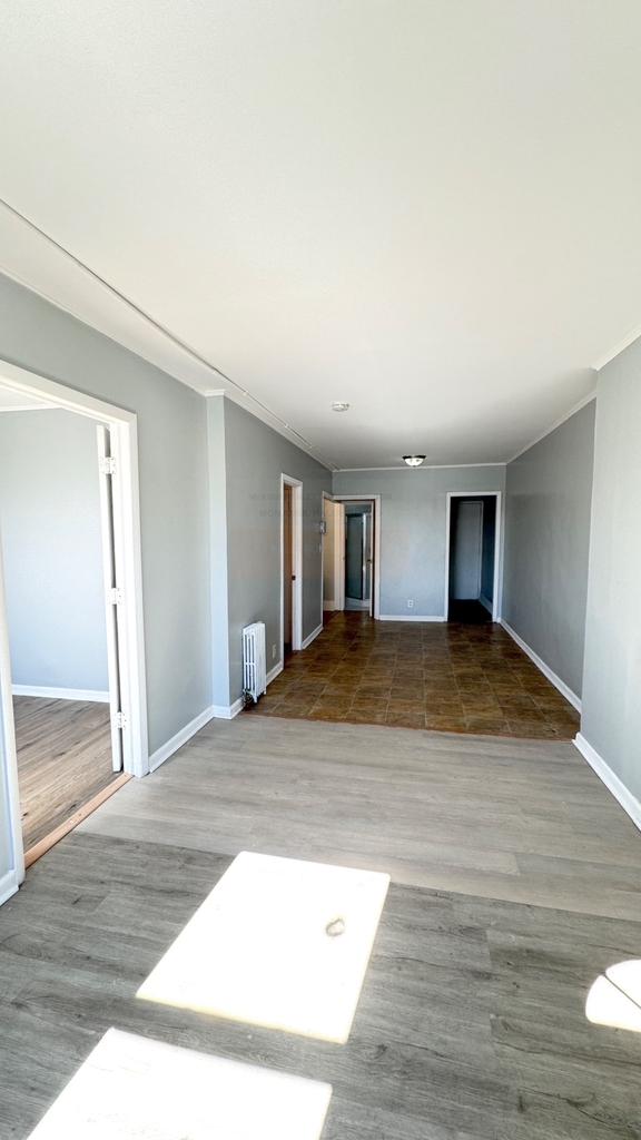 Living room with multiple doorways