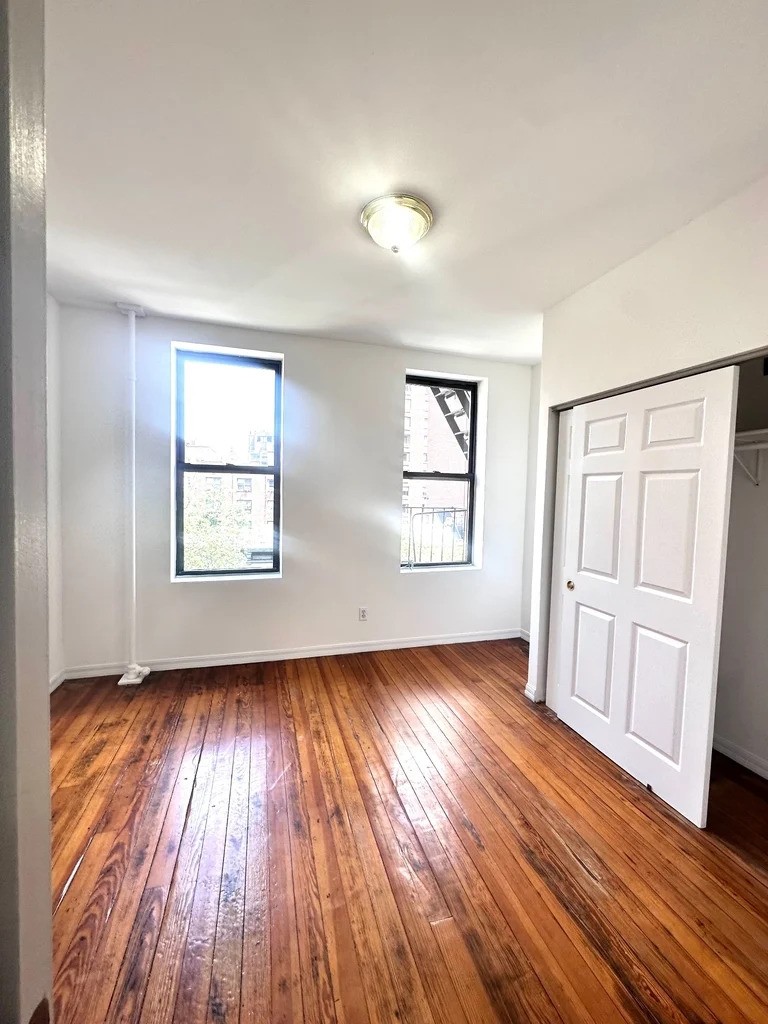 Manhattan bedroom with two windows