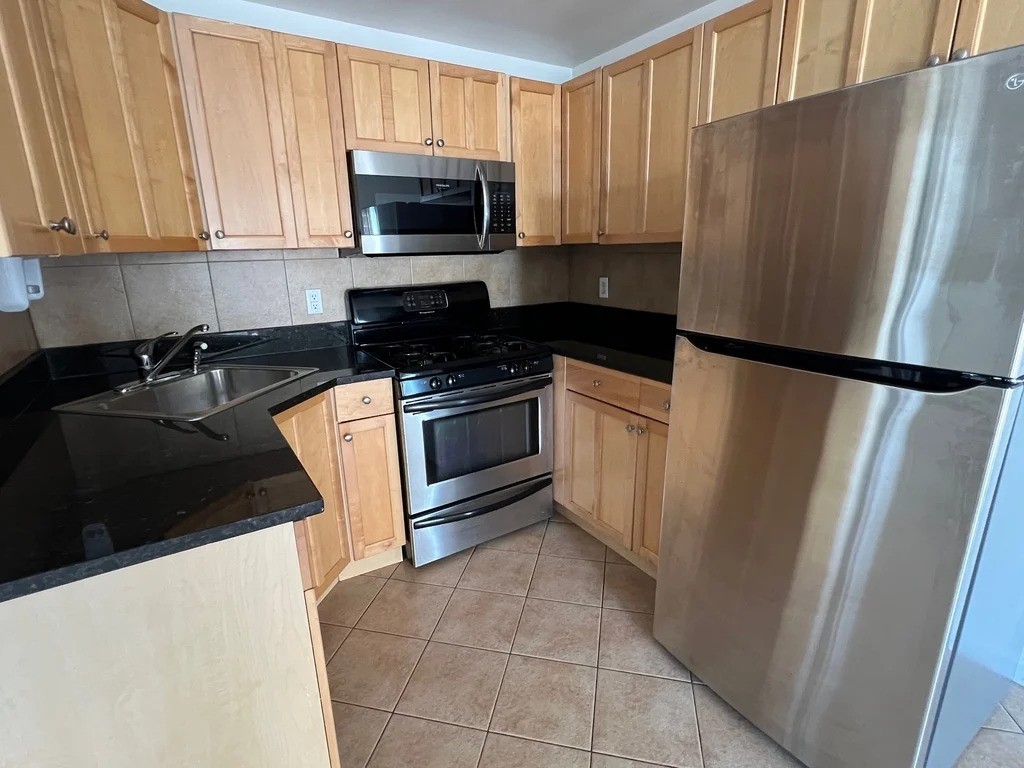 Queens apartment with stainless steel appliances