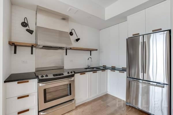 Ridgewood apartment with stainless steel appliances