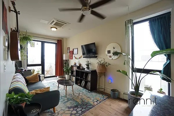 Spacious living room with oversized windows