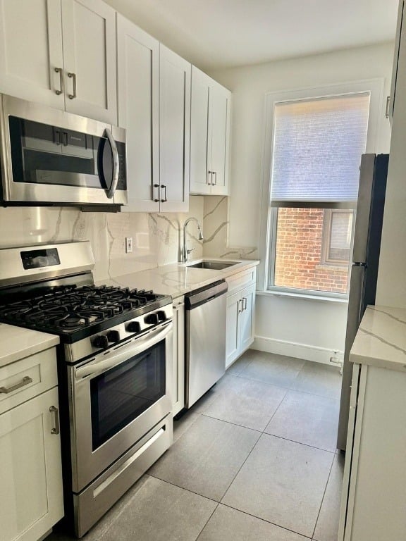 Queens kitchen with stainless steel appliances