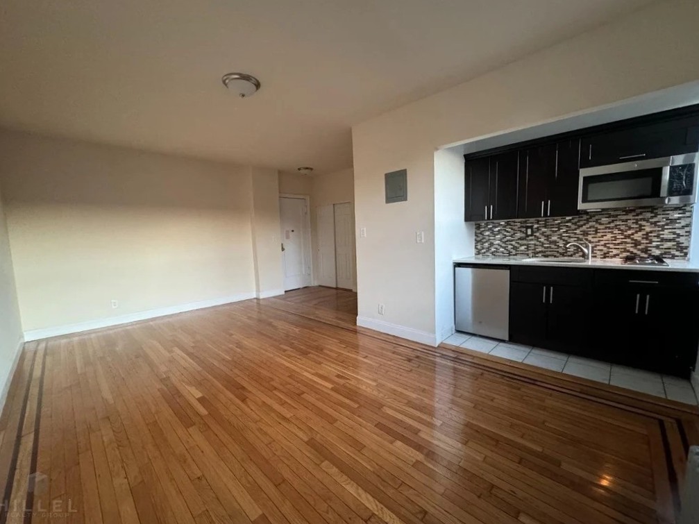 Spacious studio apartment with hardwood floors