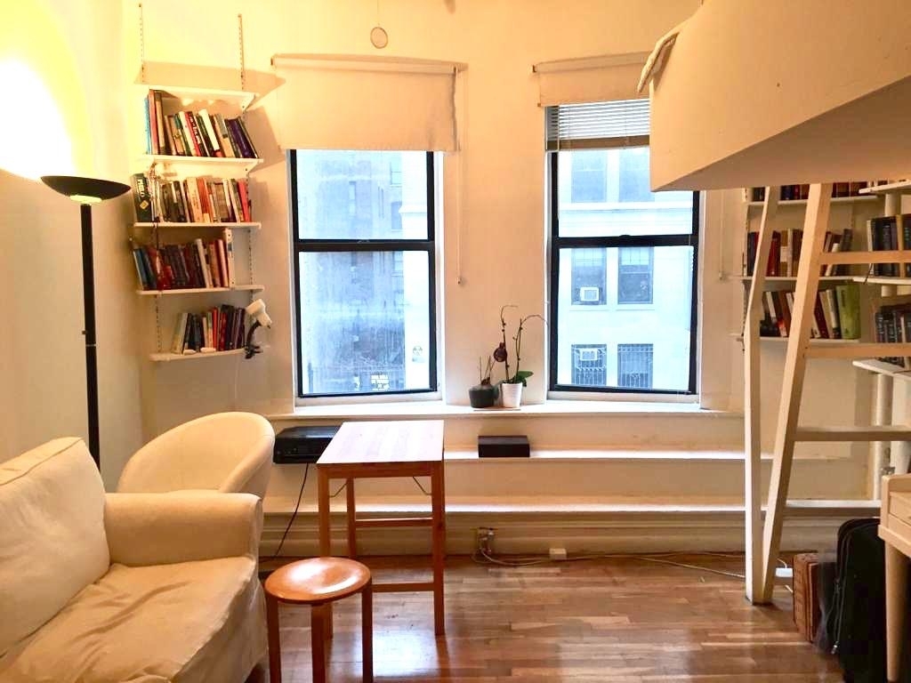 apartment photo of bedroom with lofted bed