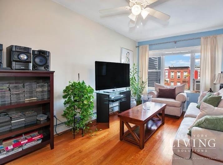 photo of a furnished apartment living room