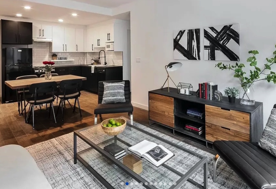 apartment photo of furnished living room with coffee table and couch