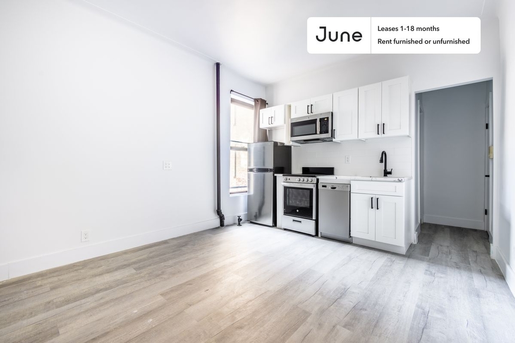 studio space with stainless steel appliances